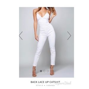 Bebe white lace up back jumpsuit